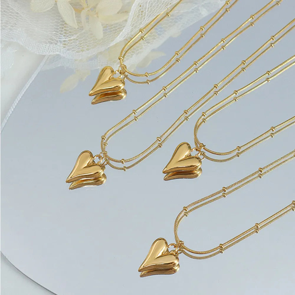 Collar con Dije de Corazón Bañado en Oro 18K PALOMA • Acero de Titanio