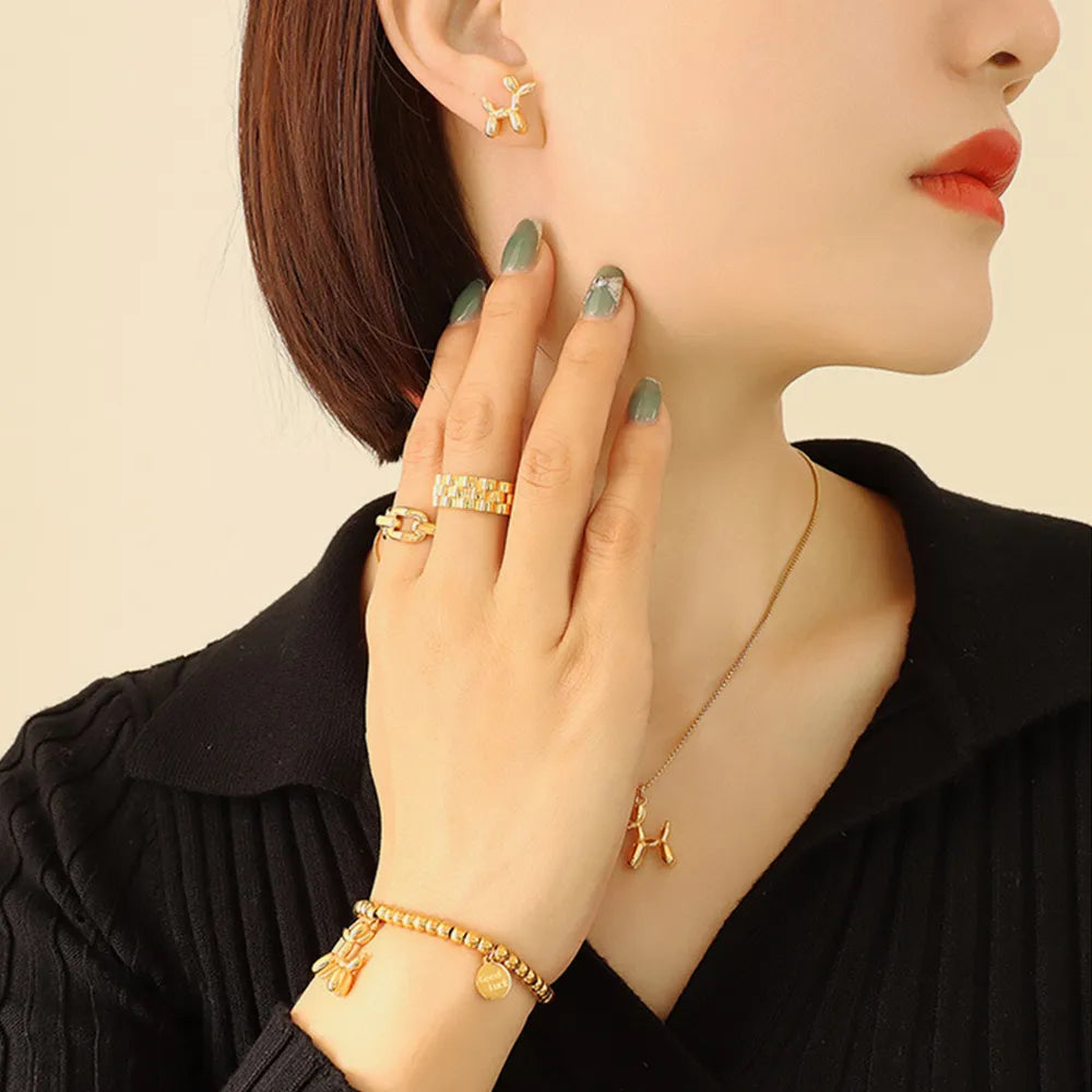 Pendientes de Perrito en Titanio Bañado en Oro 18K • Diseño Exclusivo