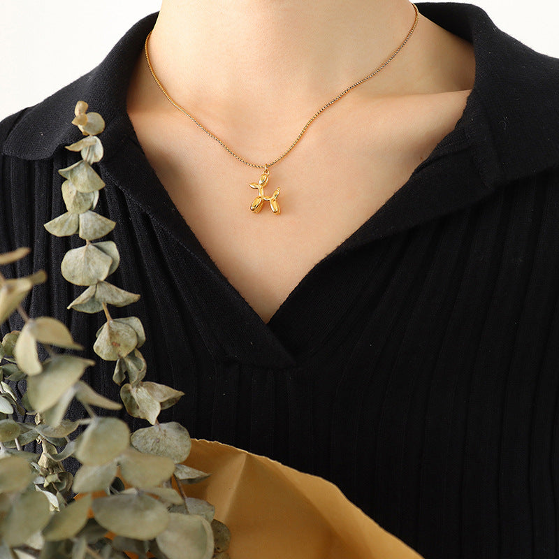 Collar Colgante de Perrito Lupe en Titanio Bañado en Oro 18K • Diseño Exclusivo