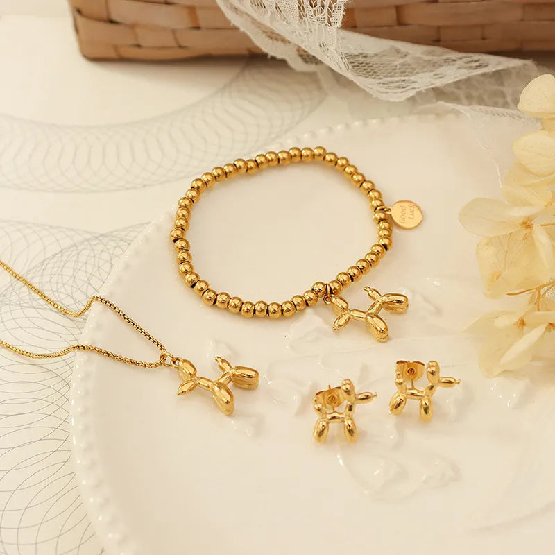 Collar Colgante de Perrito Lupe en Titanio Bañado en Oro 18K • Diseño Exclusivo